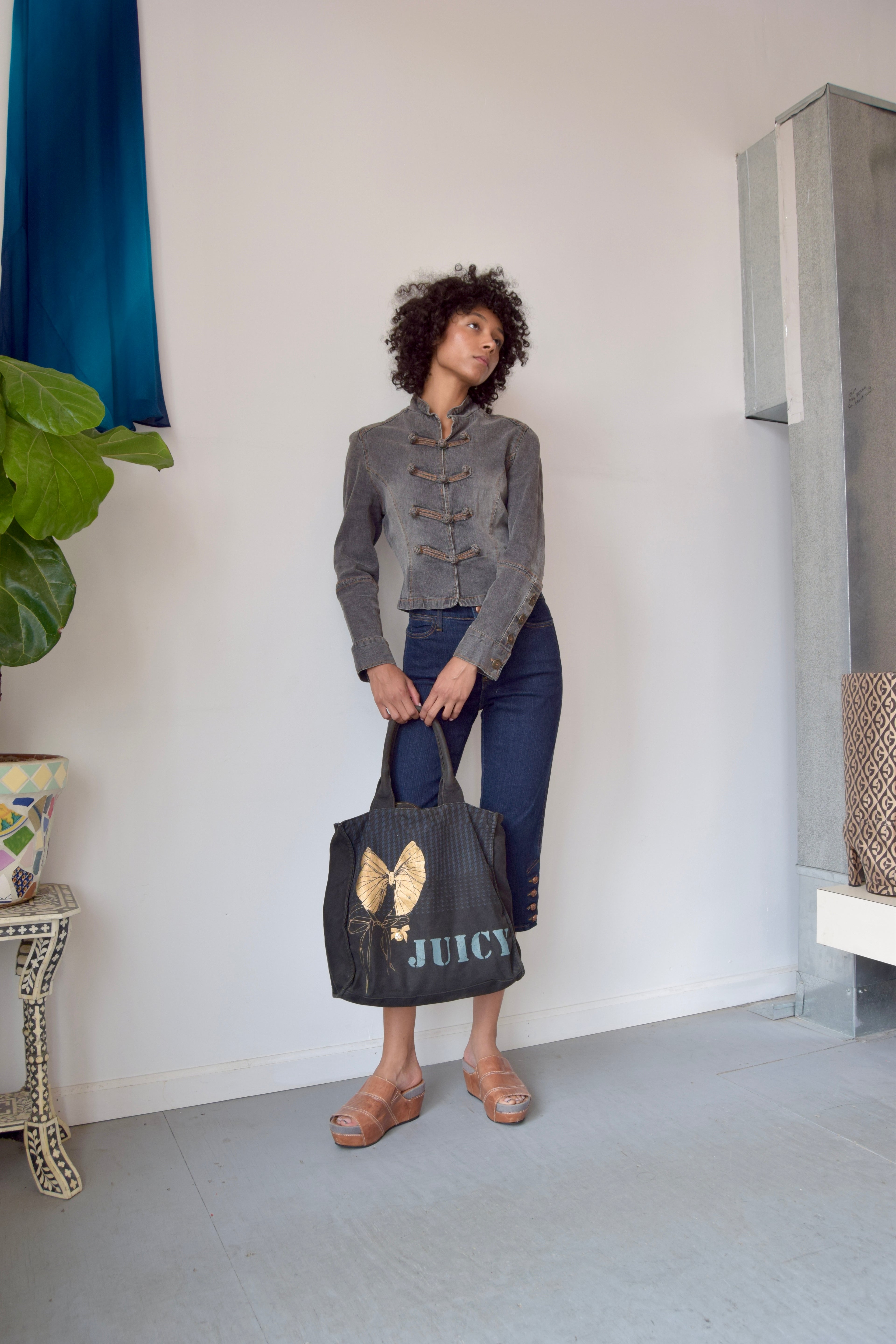 JUICY COUTURE BLACK COTTON DUFFLE PURSE WITH GOLD BOW DETAILS