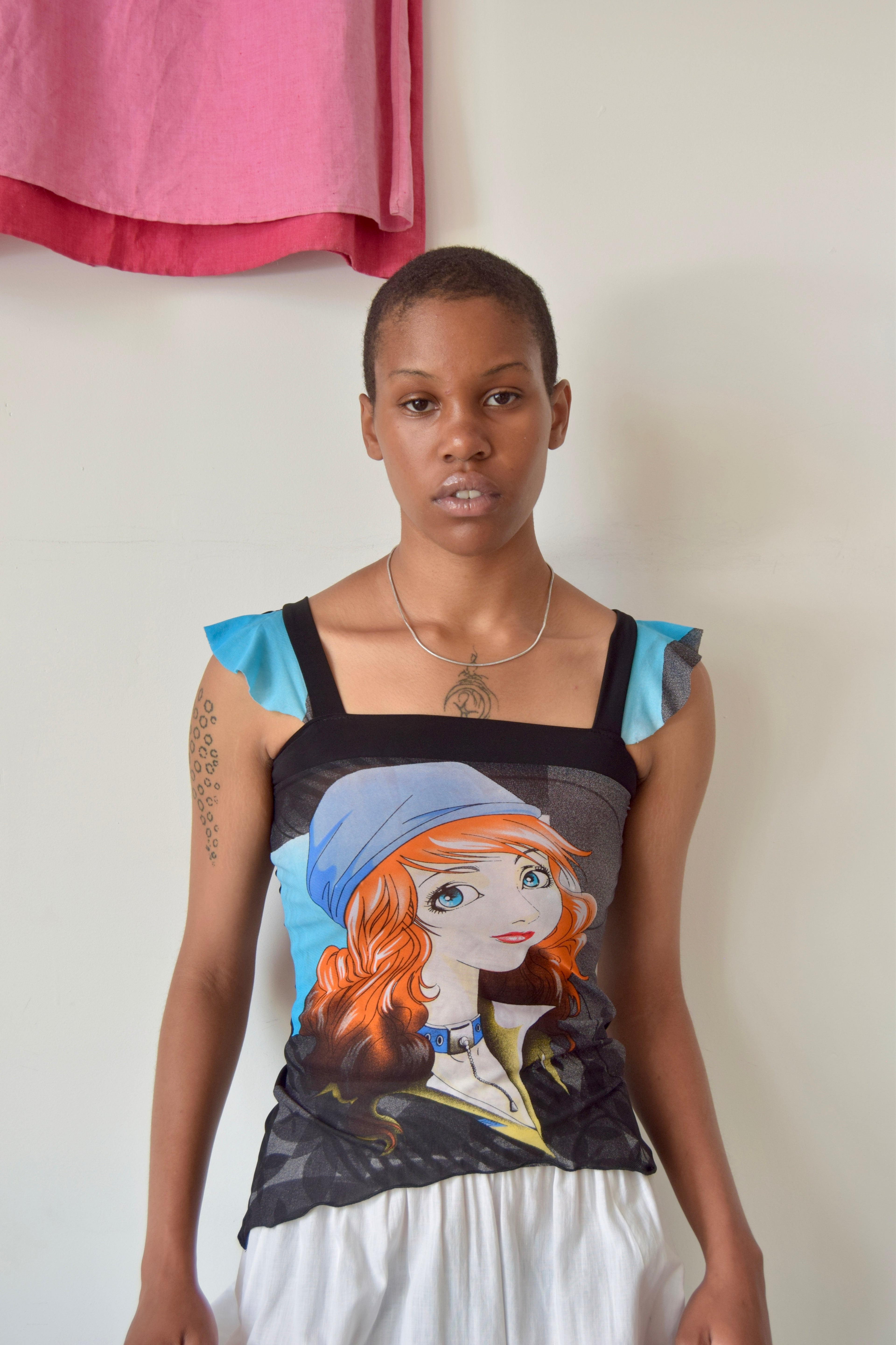 SHEER ILLUSTRATED GRAPHIC TANK WITH RUFFLE TRIM SLEEVES