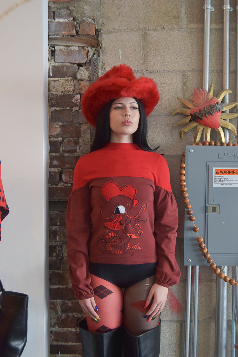AVISPADA TWO TONED RED MOCK NECK SWEATER WITH STATEMENT EMBROIDERY