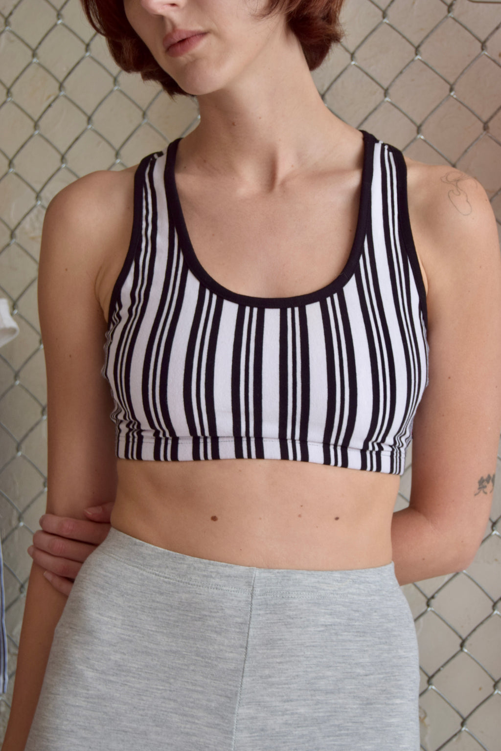 MARIKA BLACK AND WHITE PINSTRIPE SPORTS BRA WITH BLACK TRIM