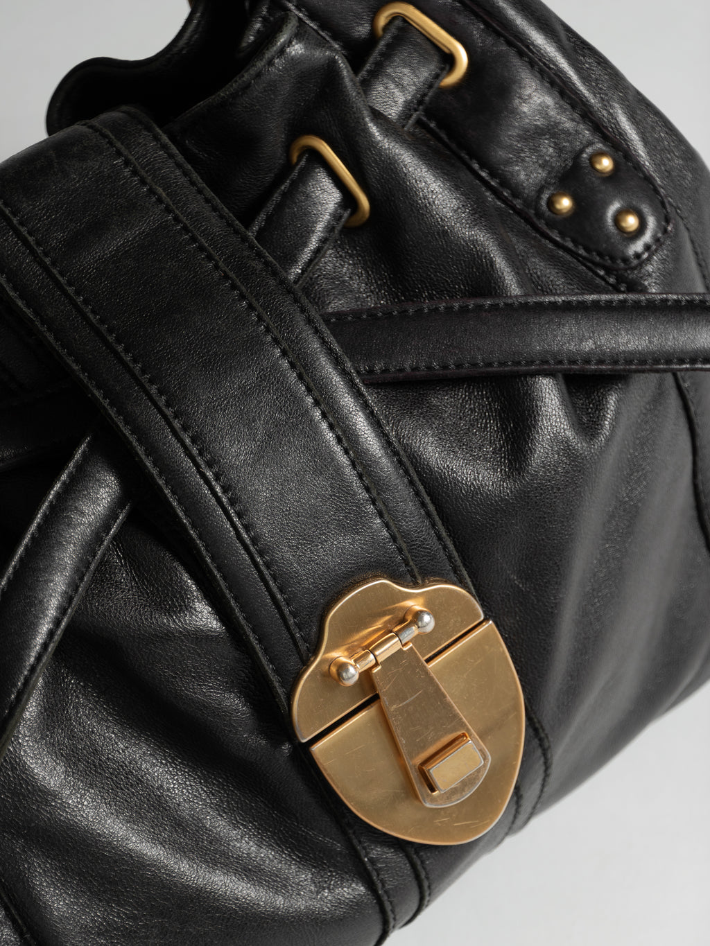 ROUGH ROSES BLACK LEATHER DRAWSTRING CLOSURE PURSE