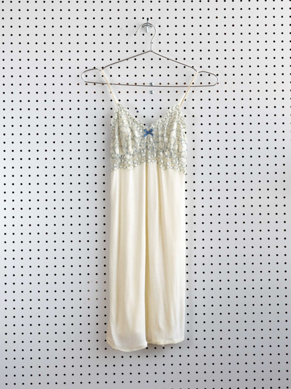 CRÈME BABYDOLL DRESS WITH BLUE LACE DETAIL
