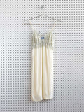 CRÈME BABYDOLL DRESS WITH BLUE LACE DETAIL