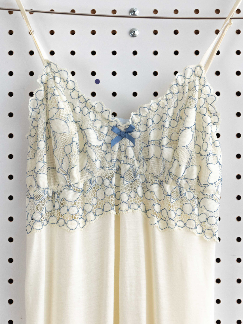 CRÈME BABYDOLL DRESS WITH BLUE LACE DETAIL