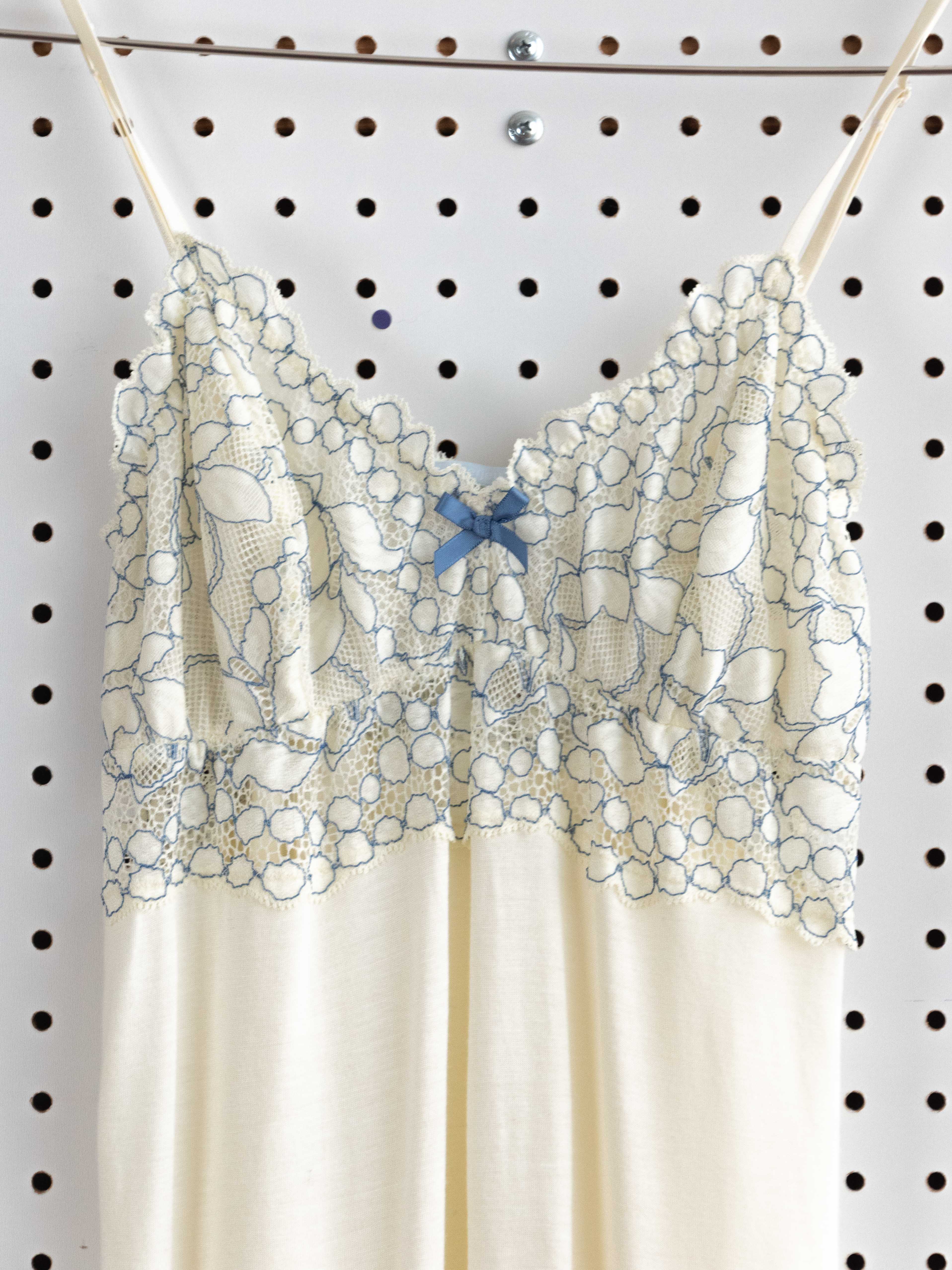 CRÈME BABYDOLL DRESS WITH BLUE LACE DETAIL